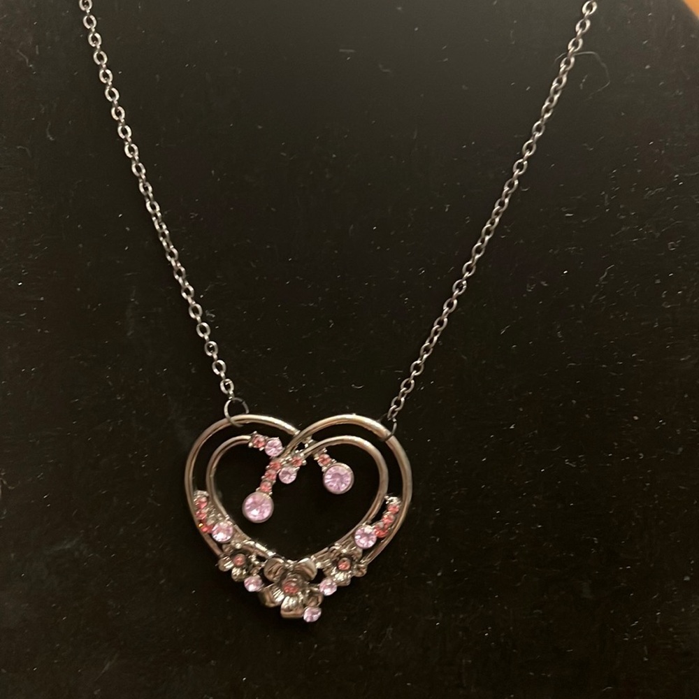 Heart necklace on black chain